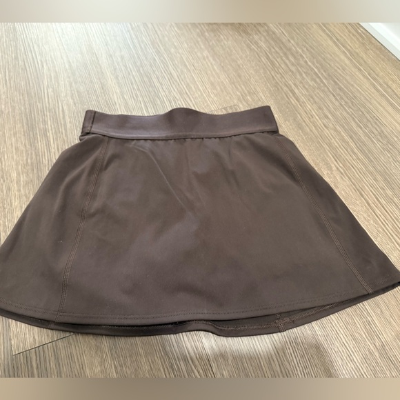 TnaSLICK™ Court Micro Skirt in rich mocha brown - Picture 1 of 5